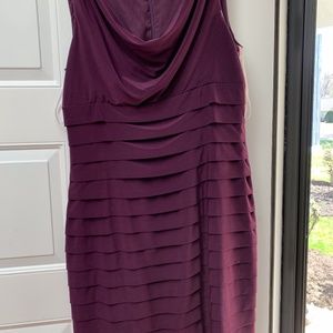 Flattering function dress.  Lined with a kind of n